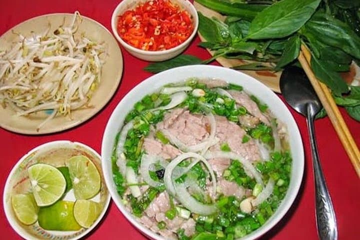 Hanoi Train Street Food Tour: Private Old Quarter Walking & Tasting Experience photo 5
