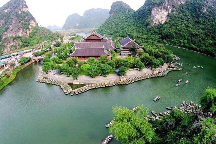 Bai Dinh & Trang An Full-Day Tour: Pagoda, Boat Caves & Countryside Cycling