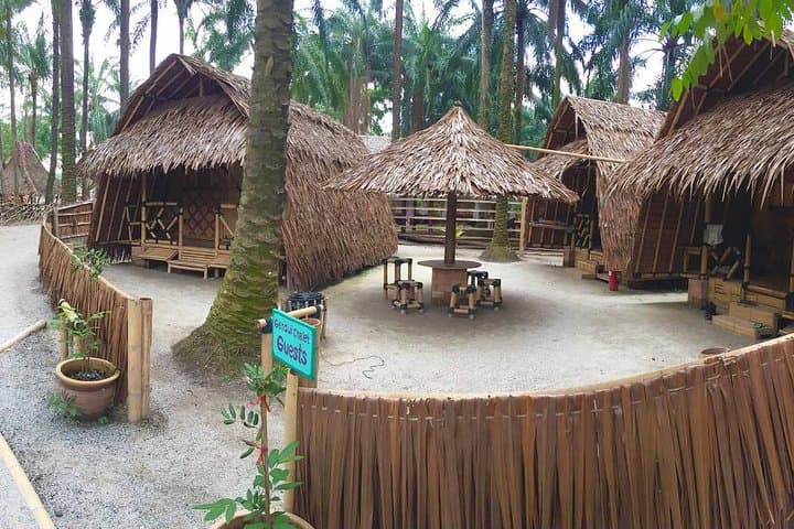 Stay in a Bamboo Hut at Tadom Hill Resort: Lakeside Swings, 5m Diving Platform & Rustic Camping photo 5