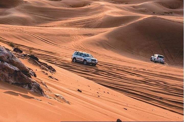 Dubai Red Dunes Safari: Evening Dune Bashing, Camel Rides and Bedouin Camp Experience photo 1
