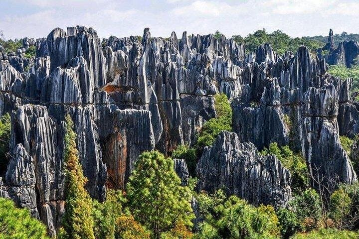 Stone Forest & Nuohei Yi Village: A Day Through Karst Spires and Yi Culture
