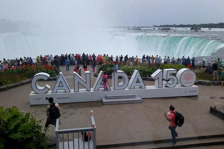Niagara Falls Canadian Side Tour: Boat Cruise, Journey Behind the Falls & Skylon Tower photo 3