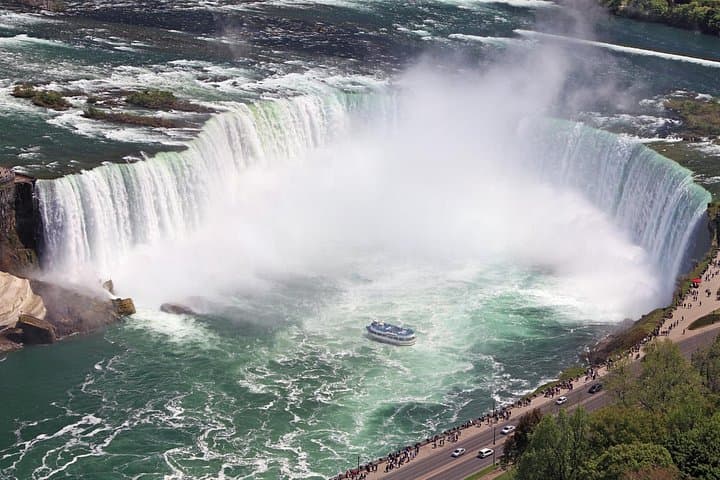 Niagara Falls Canadian Side Tour: Boat Cruise, Journey Behind the Falls & Skylon Tower photo 4