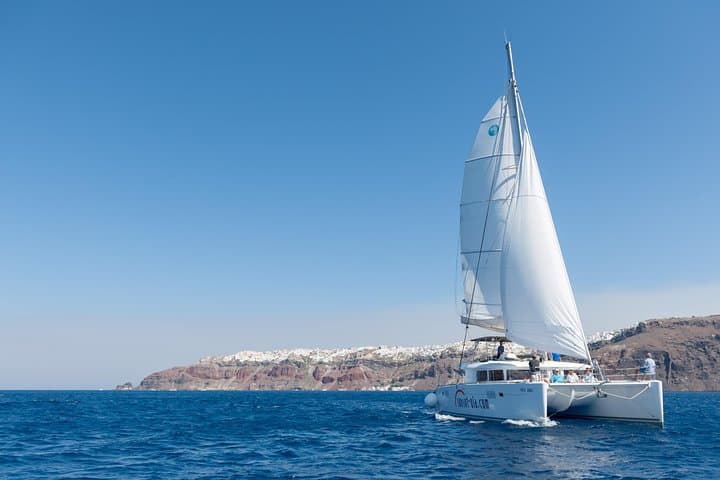 Santorini Catamaran Cruise with BBQ, Snorkeling & Hot Springs photo 4