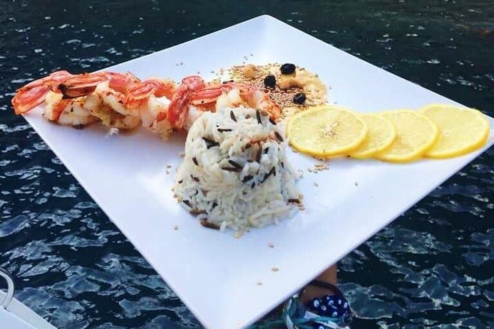 Santorini Catamaran Cruise with BBQ, Snorkeling & Hot Springs photo 6