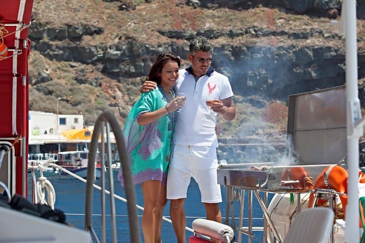 santorini-sunset-catamaran-cruise-bbq-snorkel-caldera photo 3