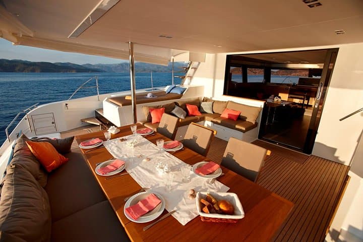 Santorini Luxury Catamaran Cruise: BBQ, Hot Springs & Caldera Swim photo 3