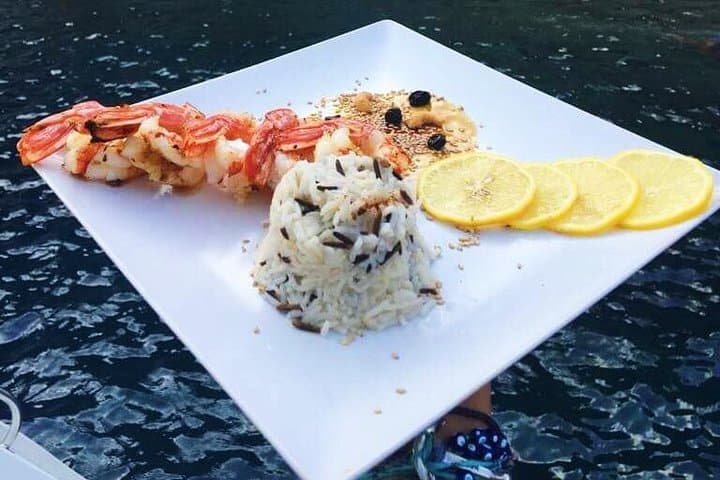 Santorini Luxury Catamaran Sunset Cruise with BBQ, Drinks & Hot Springs Swim photo 3
