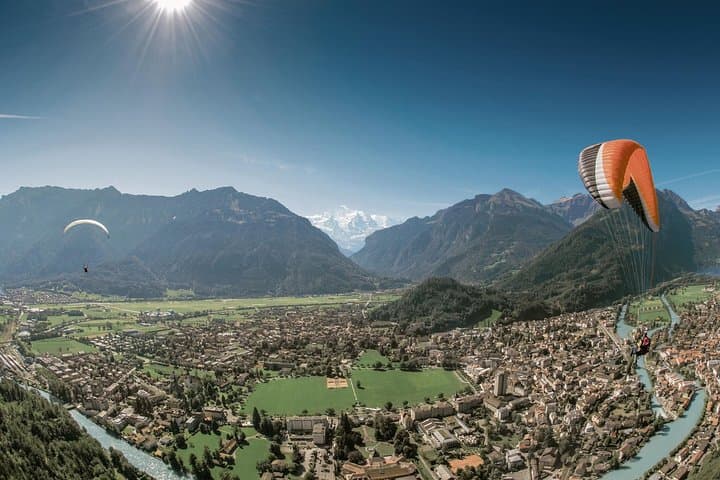 Full-Day Paragliding Experience from Geneva to Interlaken: Fly over the Jungfrau Region