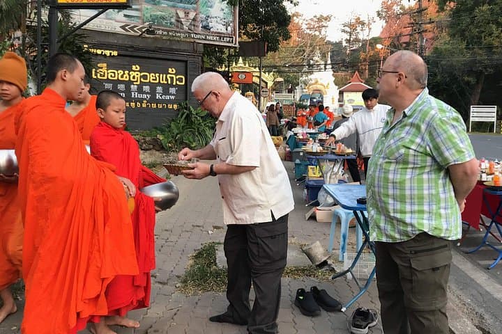 Doi Suthep Alms & Wat Phra That Private Chiang Mai Tour — Tak Bat and Warorot Market photo 4