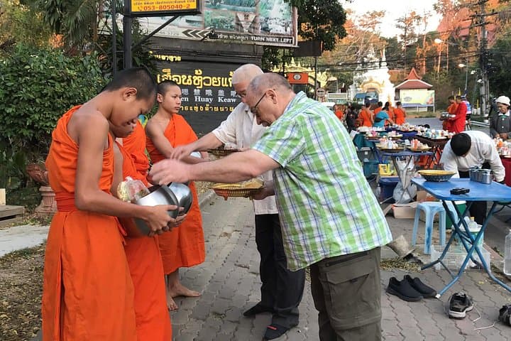Doi Suthep Alms & Wat Phra That Private Chiang Mai Tour — Tak Bat and Warorot Market photo 1