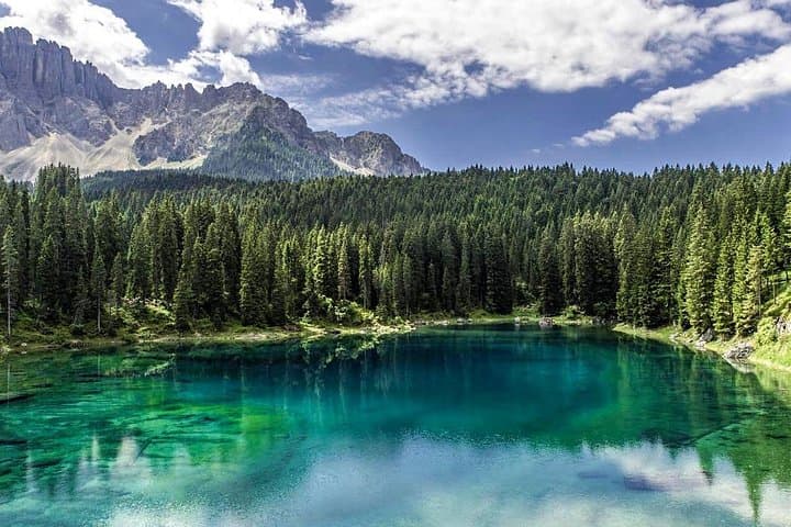 Scenic 4-Day Dolomites Tour from Milan: Tre Cime, Marmolada & Alpine Lakes photo 1