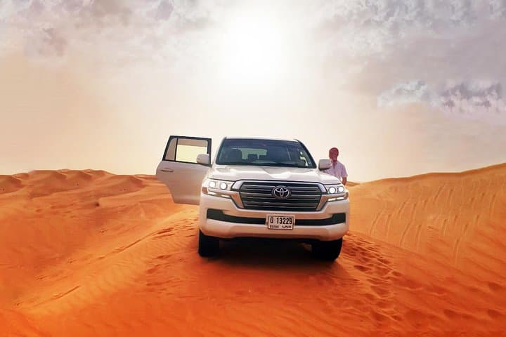 Dubai Morning Desert Safari: Dune Bashing, Sandboarding & Camel Ride