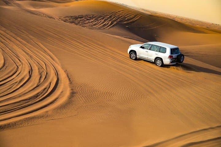 Dubai Evening Desert Safari: Dune Bashing, Camel Ride & Sunset BBQ Experience photo 5