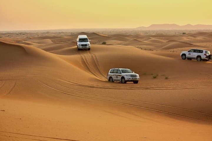 Dubai Evening Desert Safari: Dune Bashing, Camel Ride & Sunset BBQ Experience photo 6