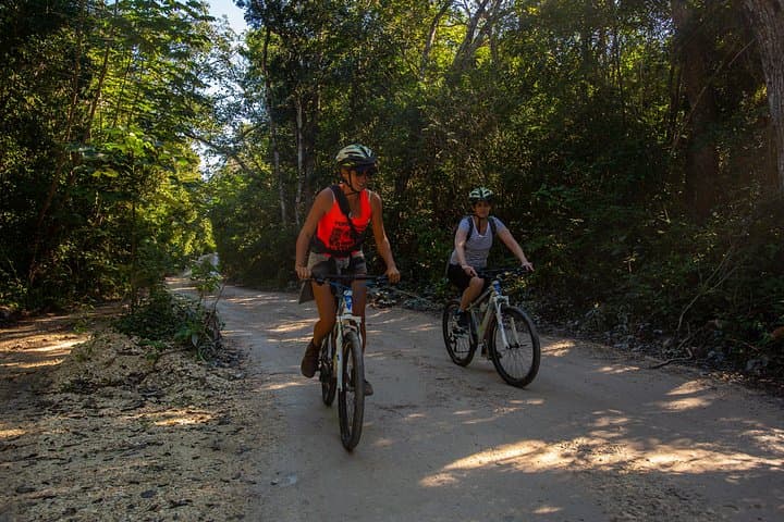 Tulum Cenotes Trail: Jungle Bike Tour, Snorkel & Zipline with Lunch photo 1