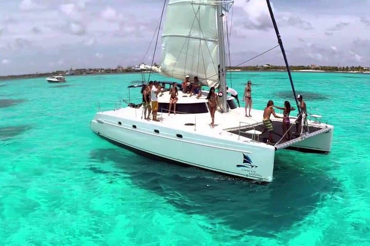 All‑Inclusive Catamaran Tour to Isla Mujeres — Snorkel, Beach Club & Open Bar