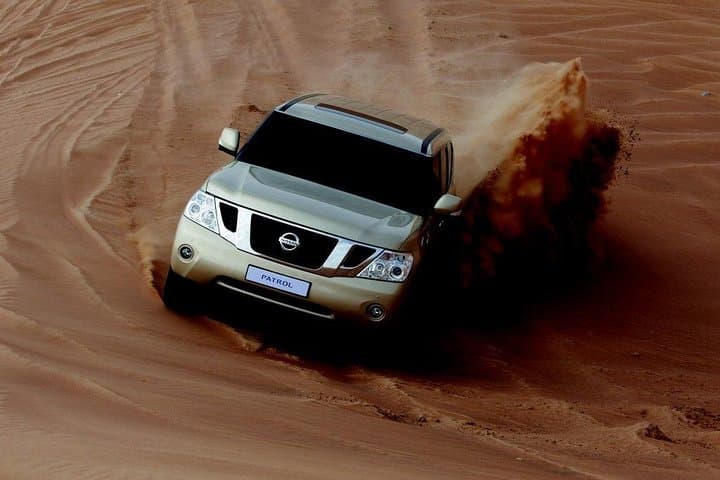 Dubai Desert Safari — Lehbab Dune Bashing, Camel Rides & Evening Camp Experience