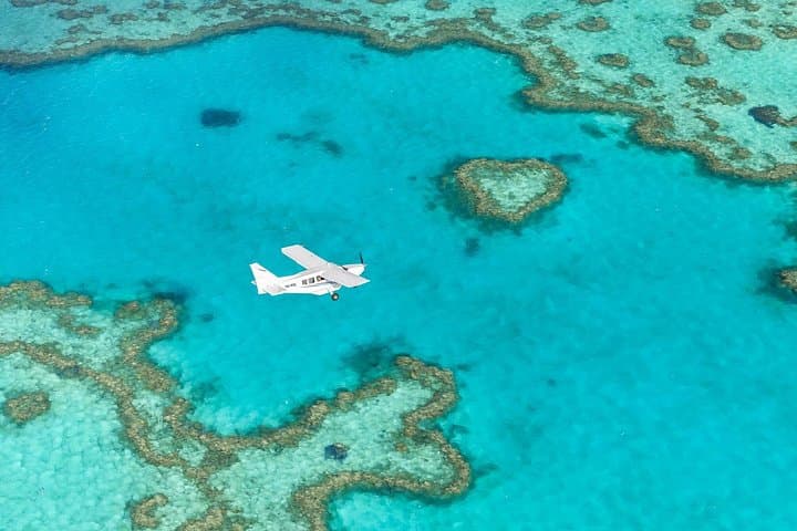 Whitsundays Fly‑Raft Day Trip: Whitehaven Beach, Hill Inlet & Heart Reef Scenic Flight photo 3