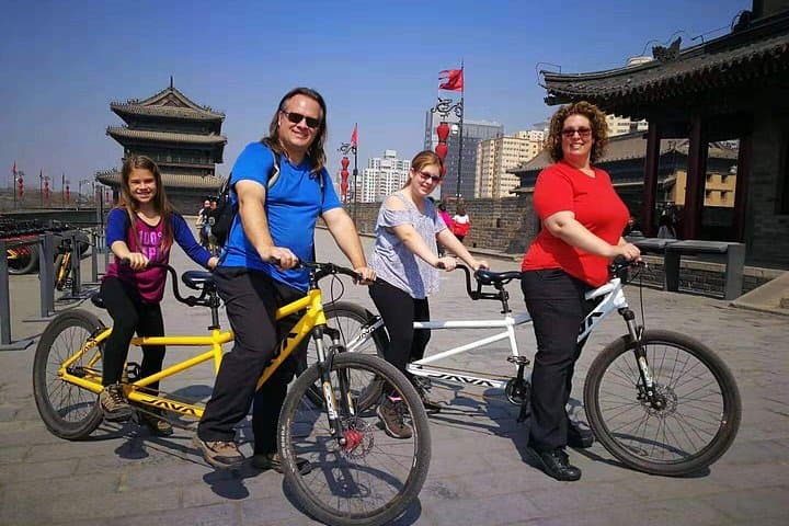 Xi'an City Wall Morning Bike & Bell Tower Walking Tour — Ride, Food Markets, Local History photo 4