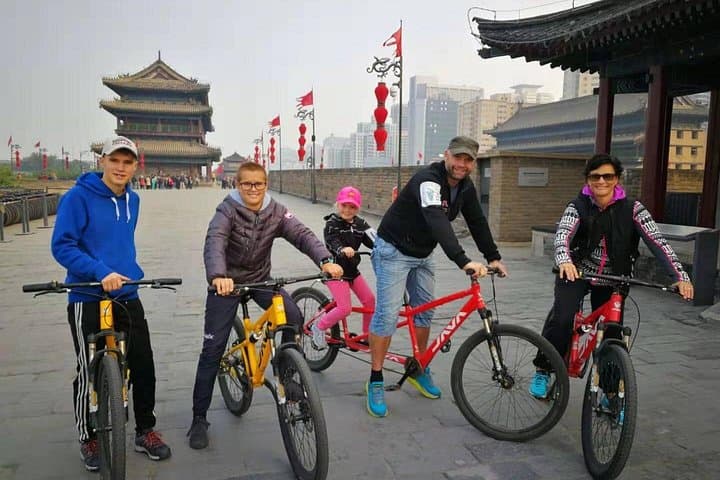 Xi'an City Wall Morning Bike & Bell Tower Walking Tour — Ride, Food Markets, Local History photo 2