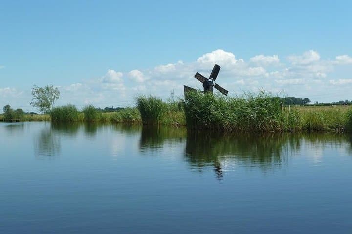 Sunset Canoe Tour in Waterland: Polders, Windmills & Lakeside Dinner photo 3