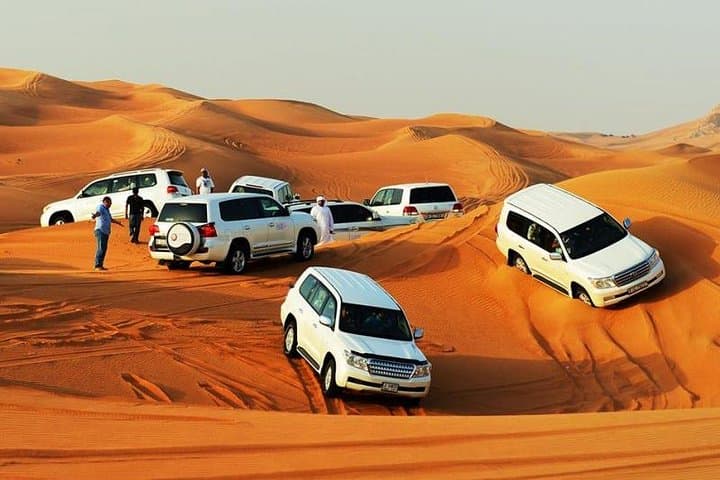 Red Dunes Desert Safari Dubai: Dune Bashing, Camel Rides & BBQ Evening