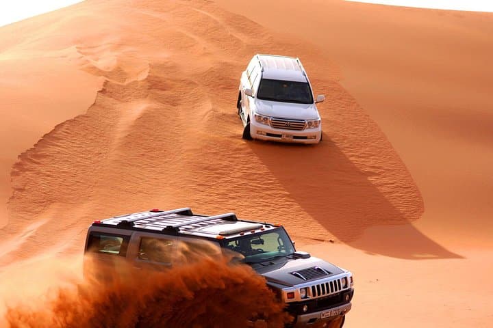 Premium Dubai Desert Safari: Dune Bashing, Sandboarding & 5-Star Desert Camp Experience