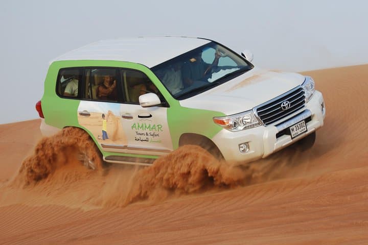 Dubai Red Dune 4x4 Morning Safari with Sandboarding and Camel Ride photo 1