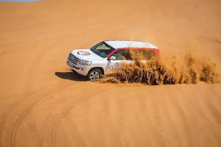 Desert Thrills & Sacred Grandeur: Dubai Red Dunes Safari and Sheikh Zayed Mosque Combo photo 2