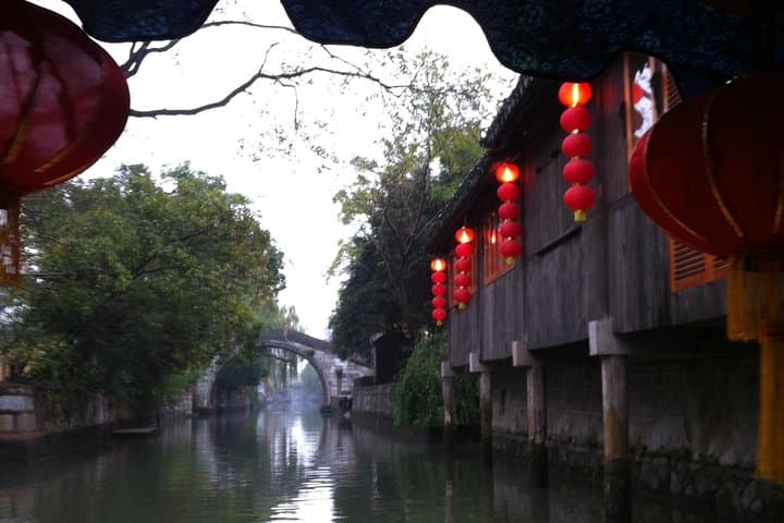 Nanxun Ancient Water Town Day Trip from Shanghai — Private Tour & Canal Ride photo 2