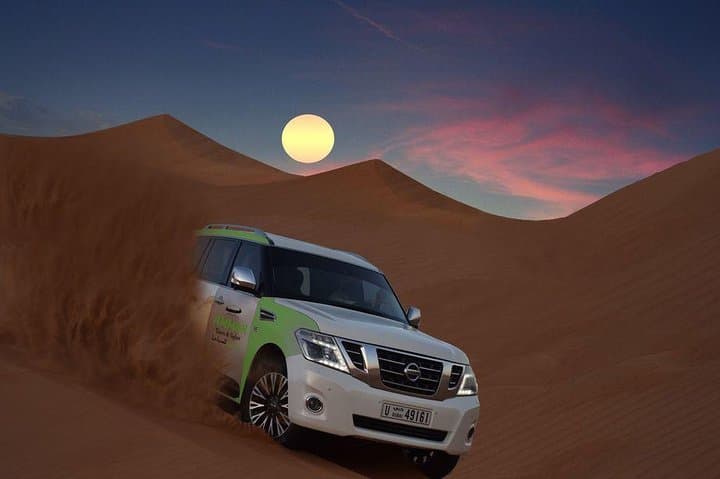 Dubai Desert Safari with Quad Bike, BBQ Dinner & Live Shows
