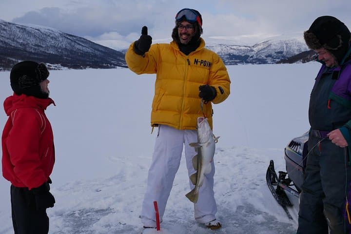 Ice Fishing on Ullsfjord: Arctic Catch & Cookout from Tromsø photo 1