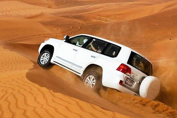 Morning Desert Safari in Abu Dhabi: Dune Bashing, Camel Rides & Sandboarding photo 1