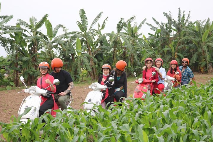 Red River Delta Vespa Tour with Female Ao Dai Riders Half-Day photo 2