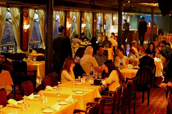 Evening Nile Dinner Cruise in Cairo: Lights, Live Music & Local Flavors