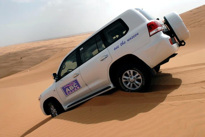 Dubai Desert Safari at Majlis Camp: Dune Bashing, Camel Rides & BBQ Sunset Experience