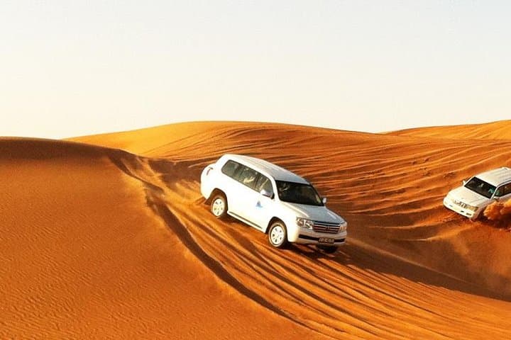 Dubai Evening Desert Safari: Dune Bashing, Camel Rides & Bedouin Camp Experience