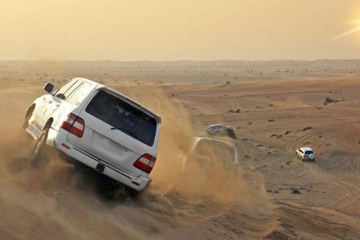 Evening Desert Safari Dubai: Dune Bashing, Sunset & BBQ Under the Stars