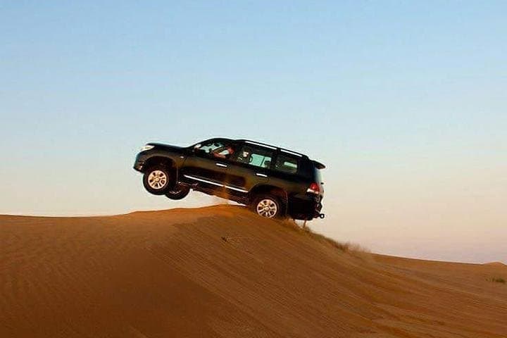 Sunset Desert Safari Dubai: Red Dunes, Belly Dance & BBQ Evening Experience