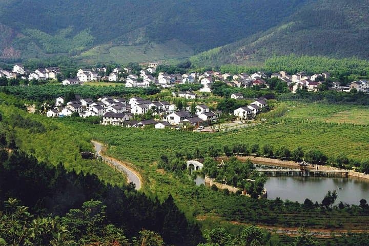 Day Escape from Suzhou: Eco-Village Walk, Home Lunch & Hot Spring Spa