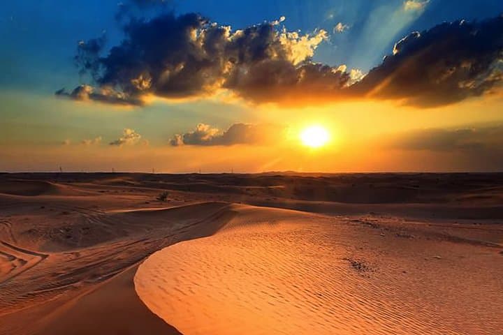 Private Sunrise Desert Safari in Dubai: Dune Driving, Camel Rides & Sandboarding