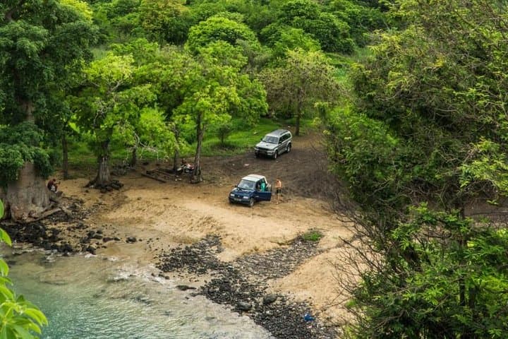 Southern São Tomé Adventure: Cão Grande, Mioba Waterfall & Pristine Beaches