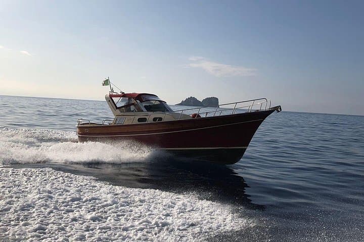 Private Capri Boat Tour from Positano: Swim, Caves & Faraglioni