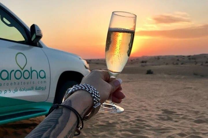 Desert Sunset Champagne Private Tour in Dubai — Dune Bashing, Sandboarding & Bedouin Camp photo 1