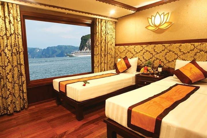 Overnight Bai Tu Long Bay Cruise: Ocean-View Cabins, Kayaking & Fishing photo 2