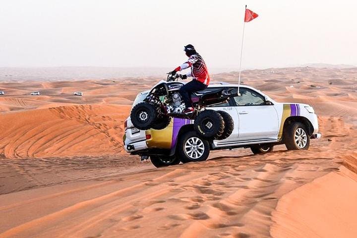 Dubai Desert Dinner Safari: Dune Bashing, Camel Ride & Sandboarding