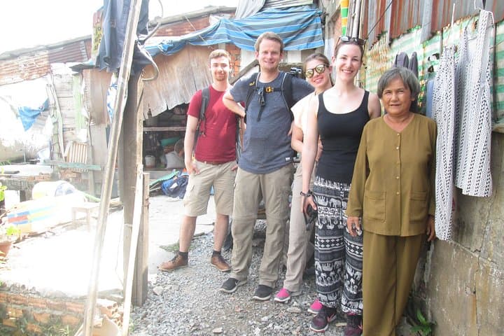 Saigon Scooter Contrast Tour: Slums, Chillspots & River Views with a Female Driver