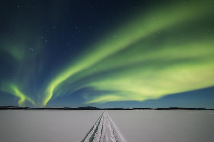 Aurora Hunt to Lake Inari from Saariselkä: Snowmobile Sleigh, Reindeer & Campfire Dinner photo 1