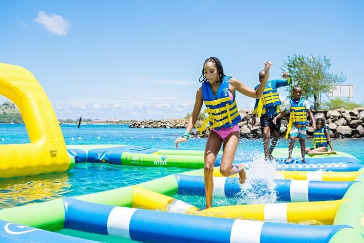 Splash Island Water Park St Lucia: Inflatable Obstacle Course at Reduit Beach photo 3